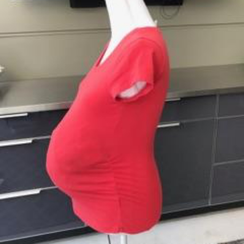 Salmon colored maternity shirt